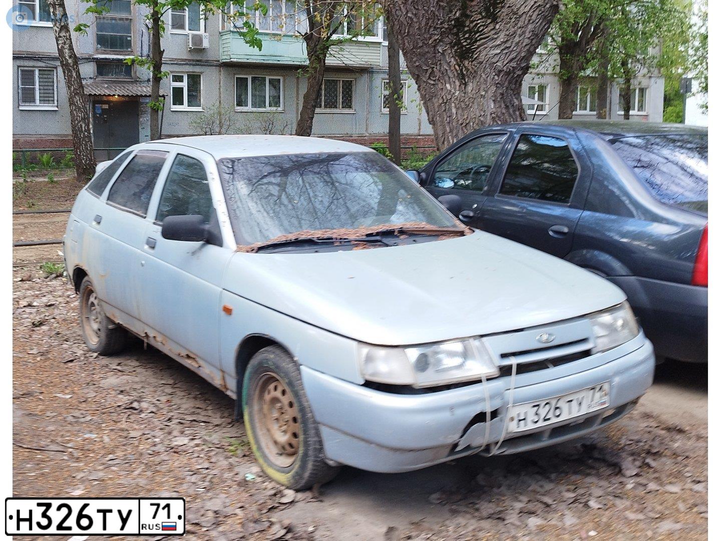 Фото автомобиля LADA 2112, 2004 — госномер Н326ТУ71. Цвет: Серебристо-Желтый