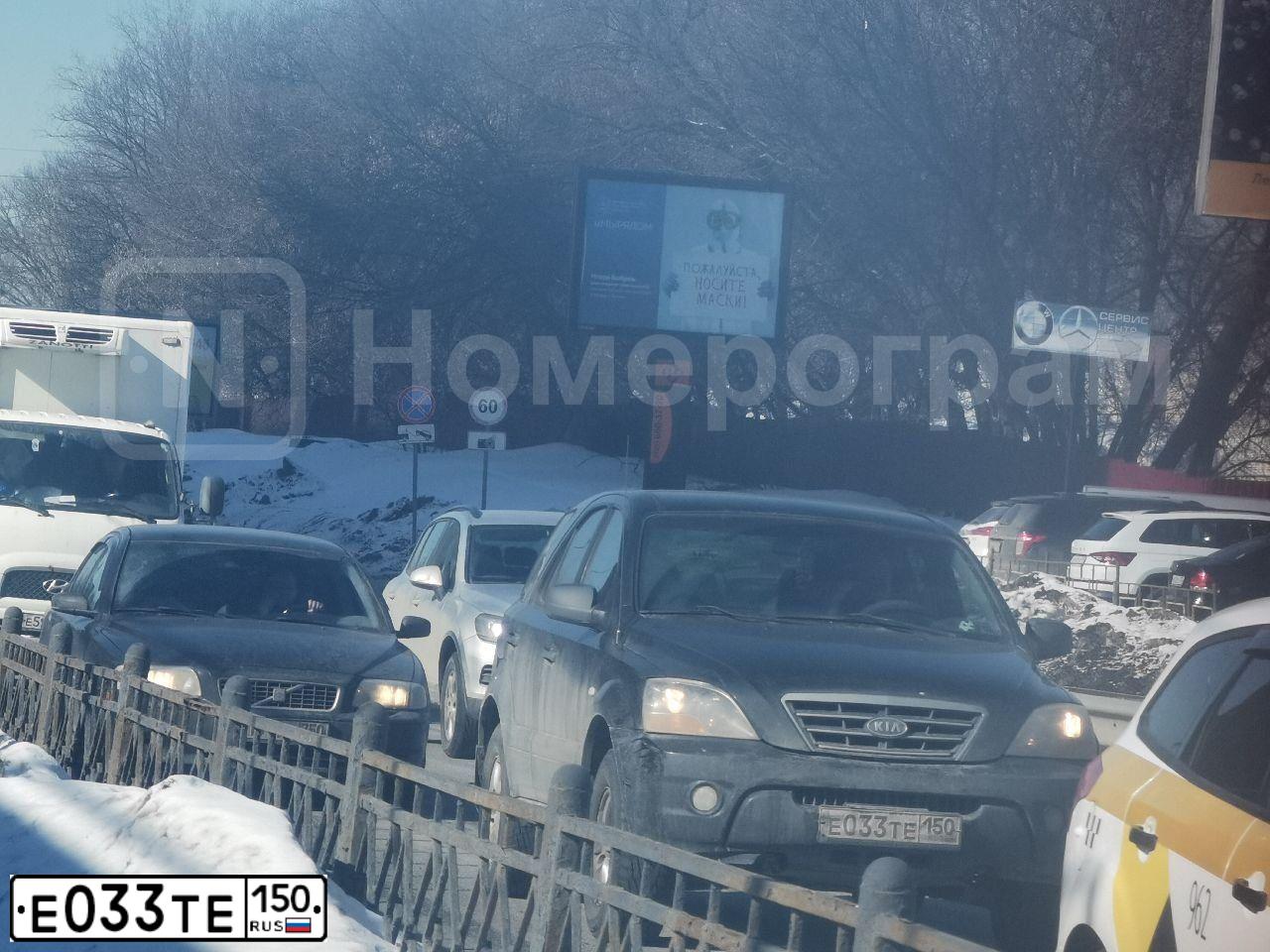 Фото автомобиля KIA SORENTO, 2008 — госномер Е033ТЕ150. Цвет: ЧЕРНЫЙ ГРАФИТ