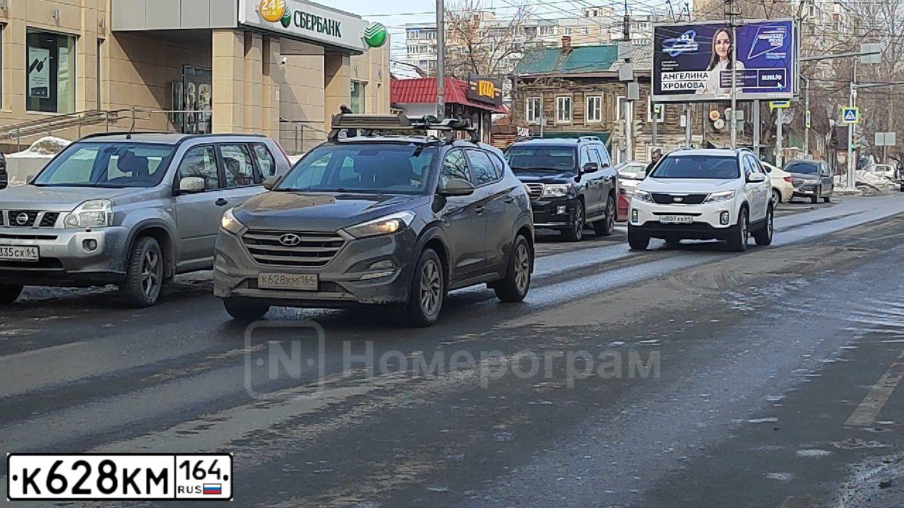 Фото автомобиля HYUNDAI TUCSON, 2016 — госномер А973ТМ777. Цвет: Коричневый