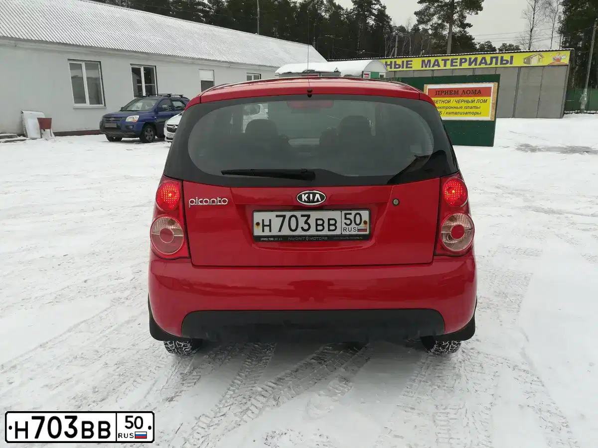 Фото автомобиля KIA PICANTO / MORNING, 2009 — госномер Е512ВМ761. Цвет: Красный