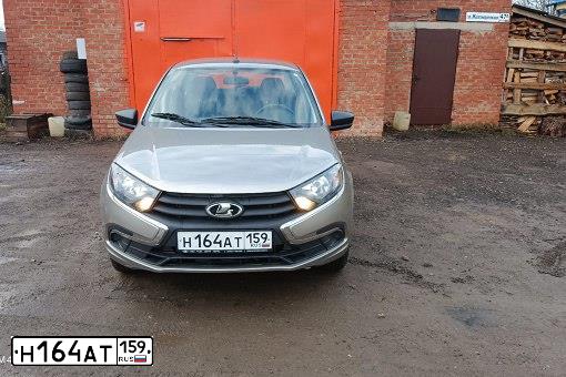 Фото автомобиля LADA 2190 GRANTA, 2020 — госномер Е871УУ186. Цвет: СЕРЫЙ