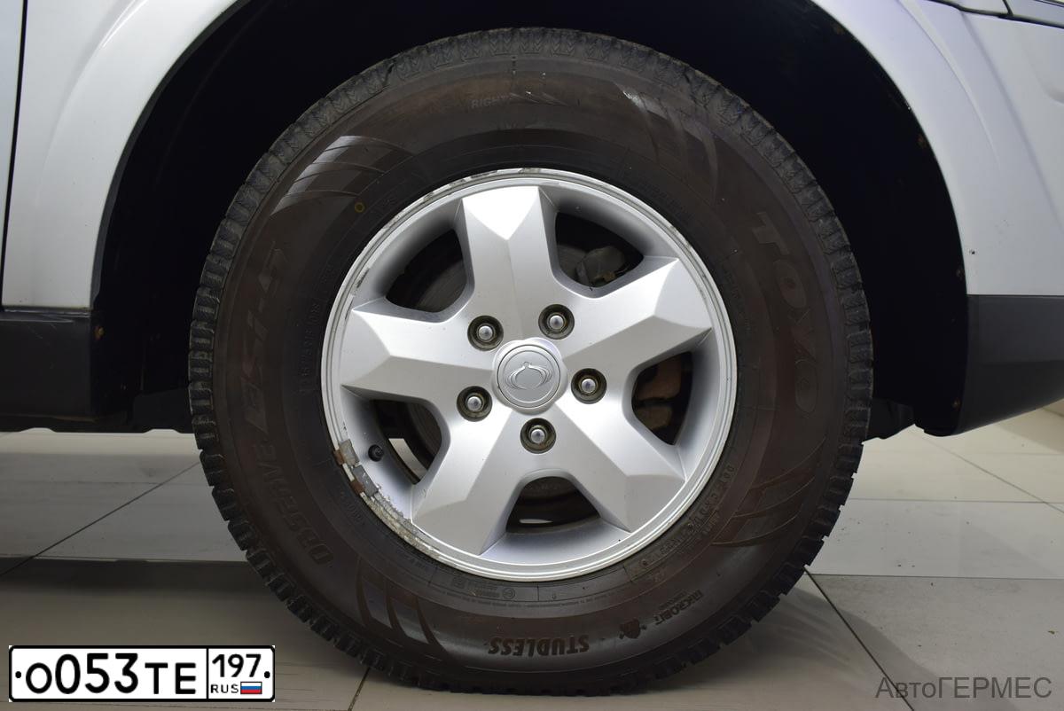 Фото автомобиля SSANGYONG KYRON, 2012 — госномер Х350КМ37. Цвет: Серебристый