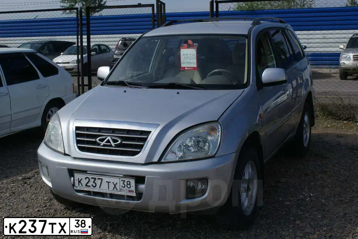 Фото автомобиля CHERY TIGGO, 2009 — госномер Н869РМ124. Цвет: СЕРЕБРИСТЫЙ