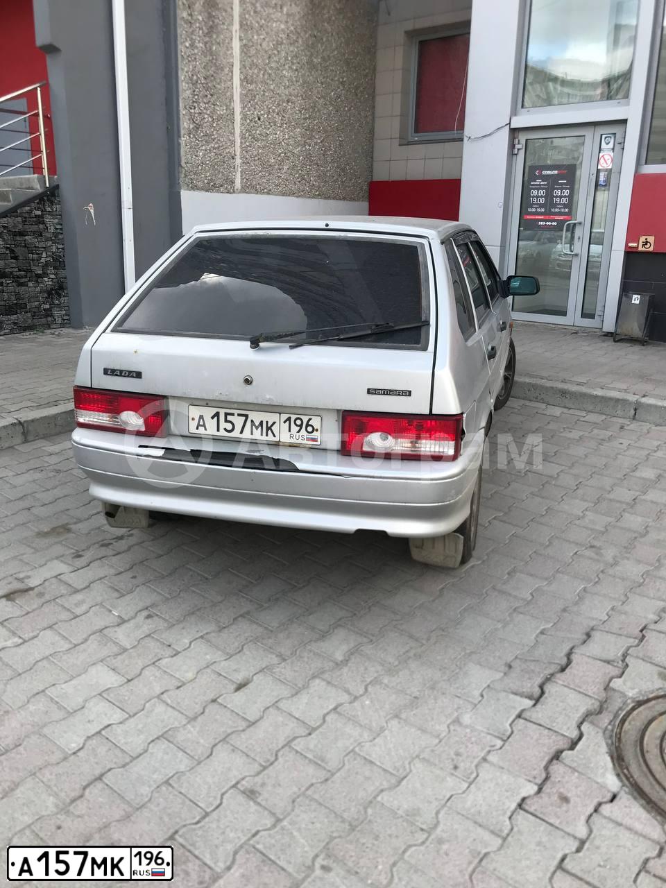Фото автомобиля LADA 2114, 2009 — госномер Н145УК702. Цвет: Серебристый