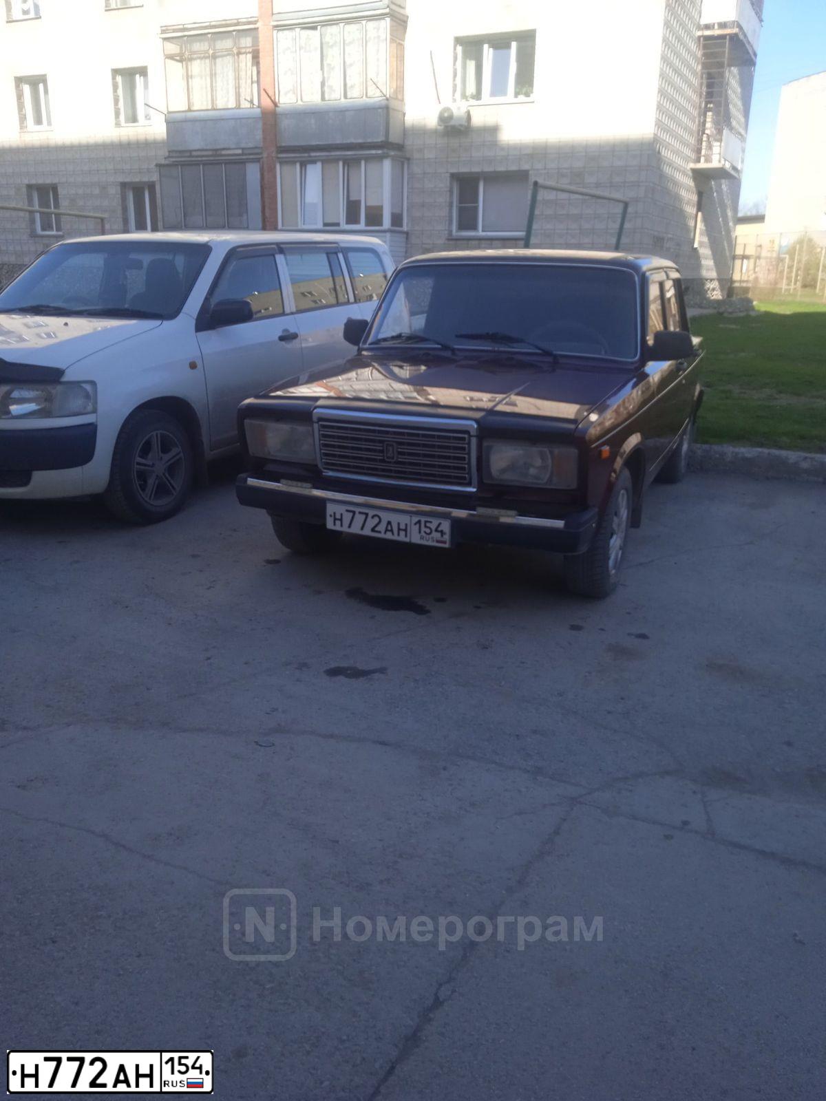 Фото автомобиля LADA 2107, 2011 — госномер Н072АН154. Цвет: СЕРЕБРИСТО-КРАСНЫЙ