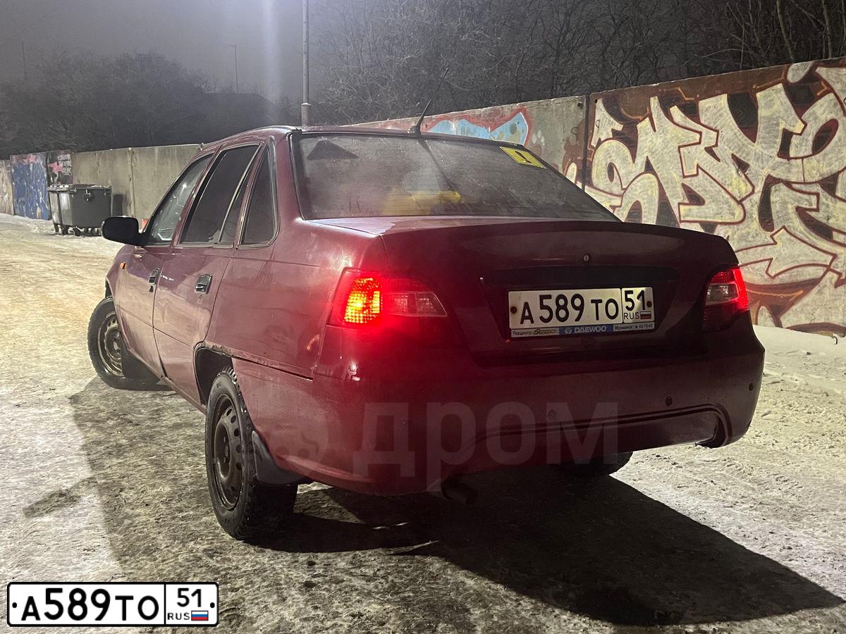 Фото автомобиля DAEWOO NEXIA, 2010 — госномер А589ТО51. Цвет: СПЕЛАЯ ВИШНЯ