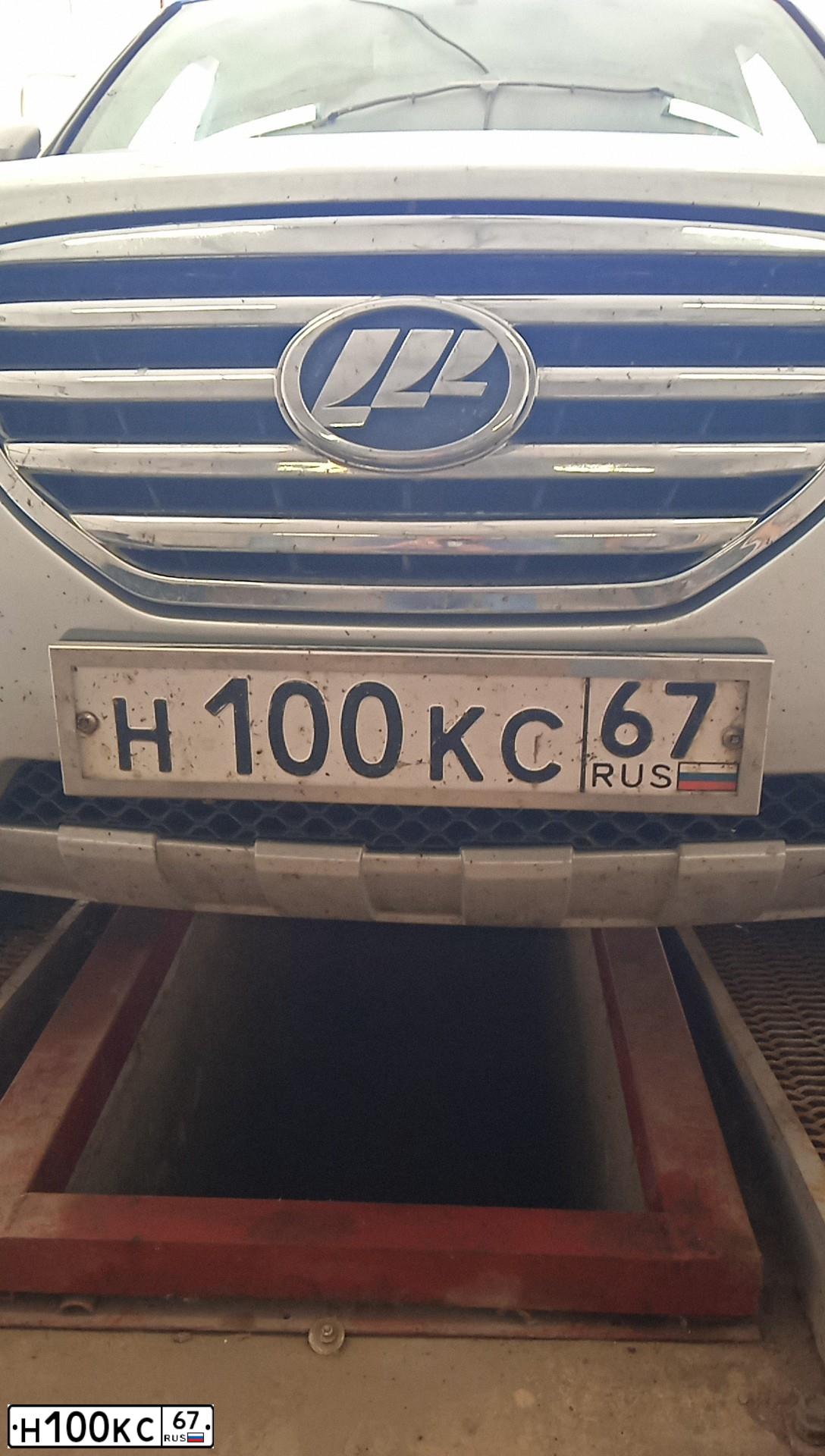 Фото автомобиля LADA 2172 PRIORA, 2011 — госномер Н100КС67. Цвет: СИНЕ-ЧЕРНЫЙ