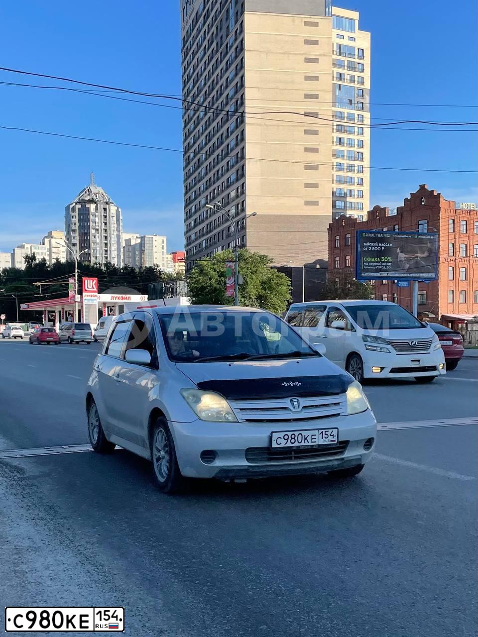 Фото автомобиля TOYOTA IST, 2003 — госномер Н075СР70