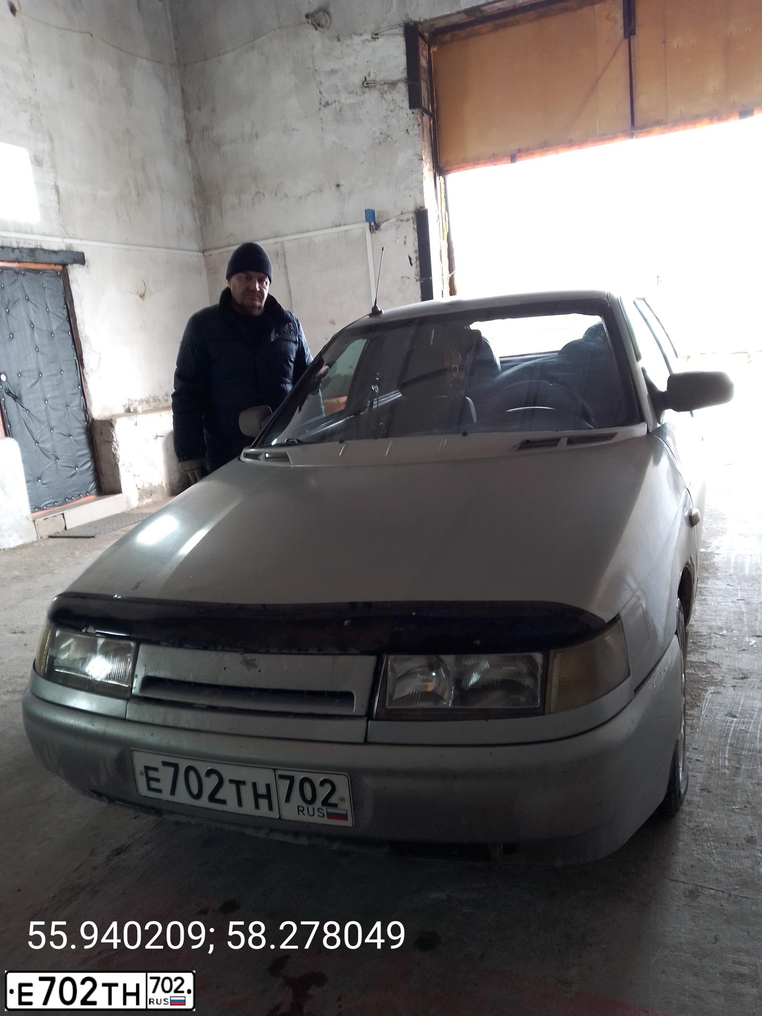Фото автомобиля LADA 2112 LADA, 2007 — госномер Е702ТН702. Цвет: СЕРЕБРИСТО-ГОЛУБОЙ