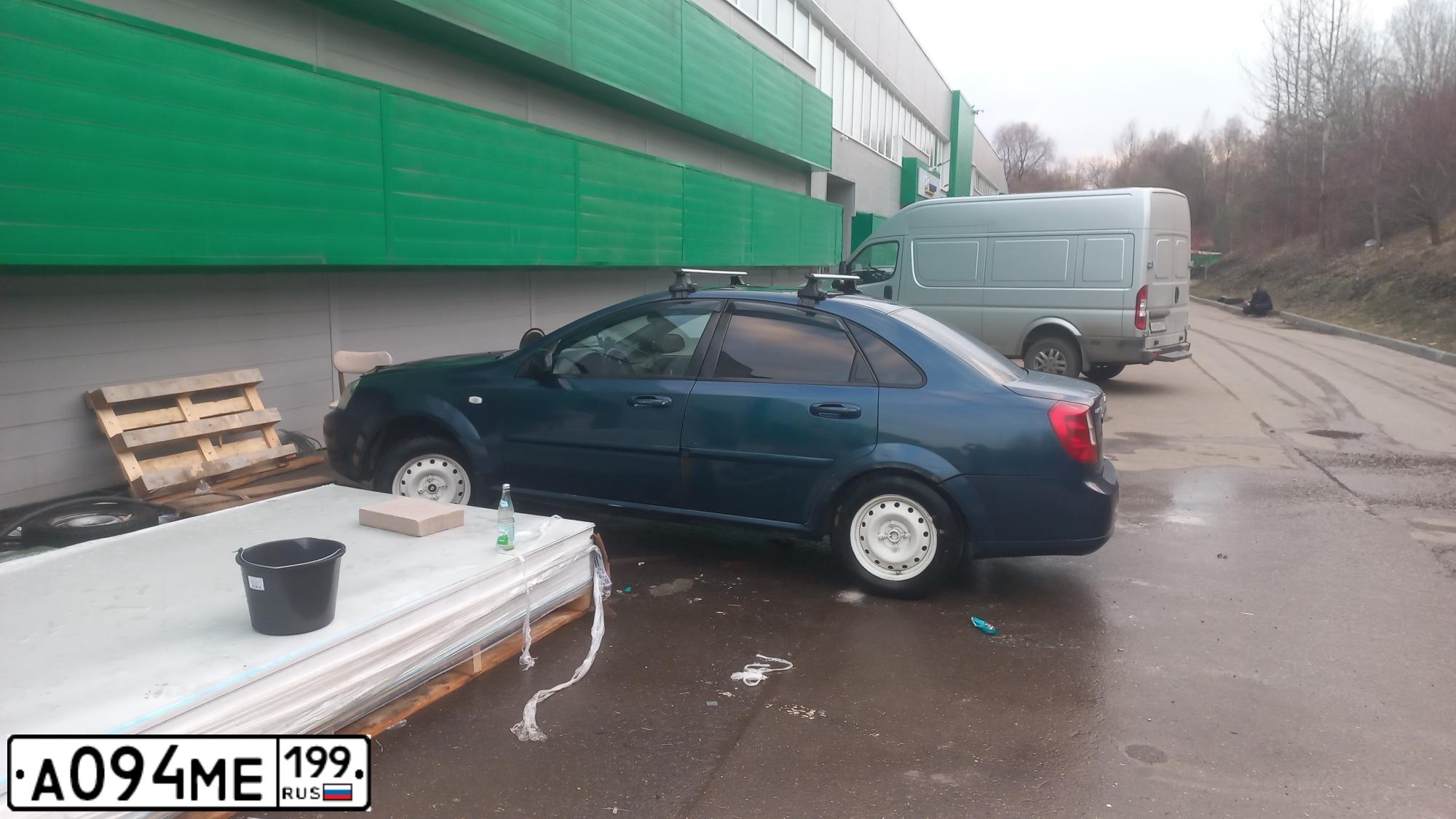 Фото автомобиля CHEVROLET LACETTI, 2008 — госномер А094МЕ199. Цвет: ТЕМНО-СИНИЙ