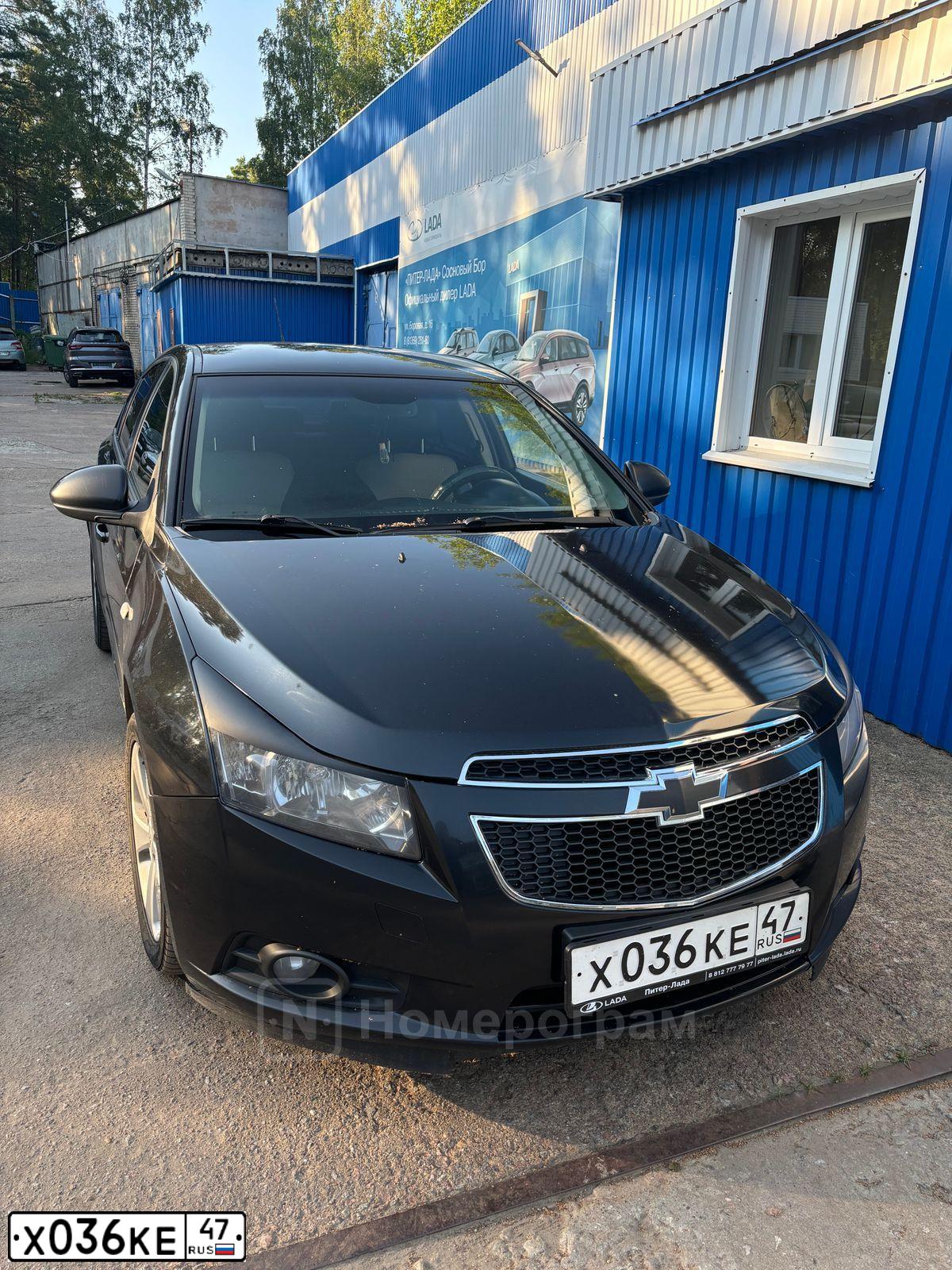 Фото автомобиля CHEVROLET CRUZE, 2012 — госномер Е567МН147. Цвет: ЧЕРНЫЙ МЕТАЛЛИК