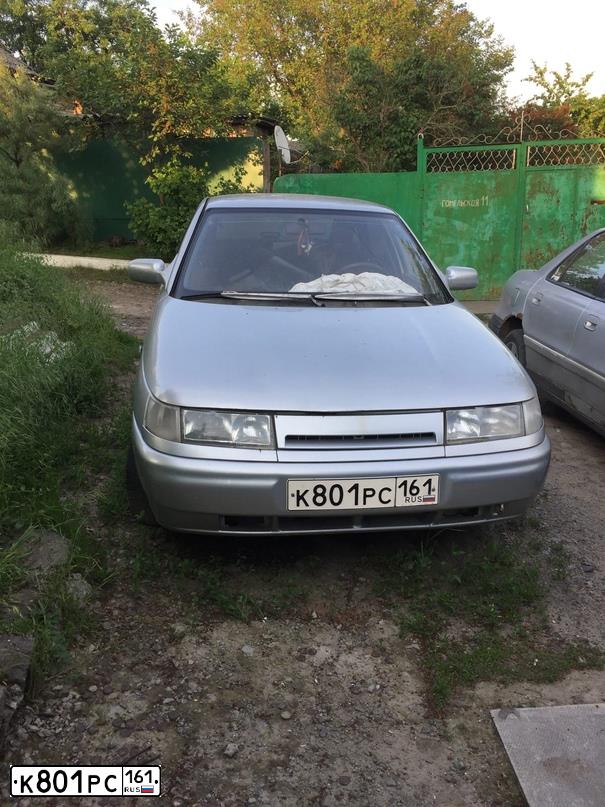 Фото автомобиля LADA 2112, 2001 — госномер К801РС161. Цвет: СЕРЕБРИСТЫЙ