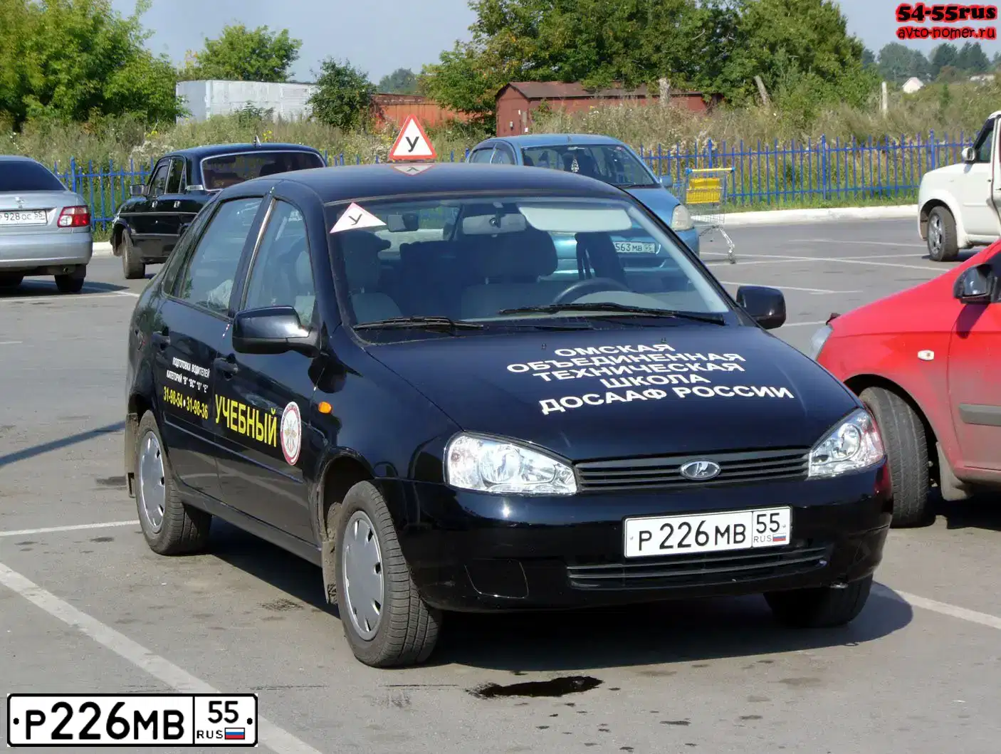 Фото автомобиля VAZ 1118 KALINA, 2010 — госномер Р226МВ55. Цвет: СИНЕ-ЧЕРНЫЙ