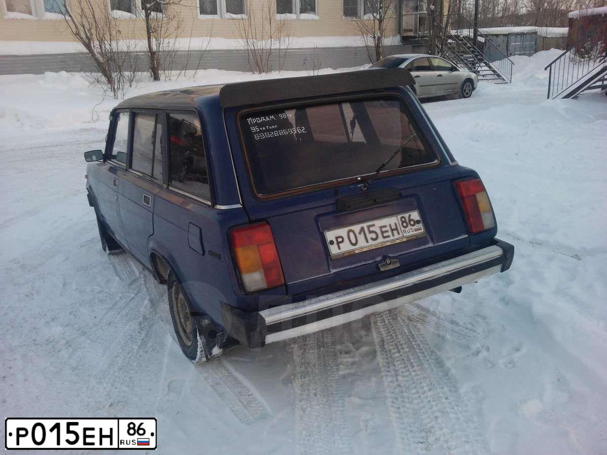 Фото автомобиля LADA 2104, 1998 — госномер Р015ЕН86. Цвет: синий
