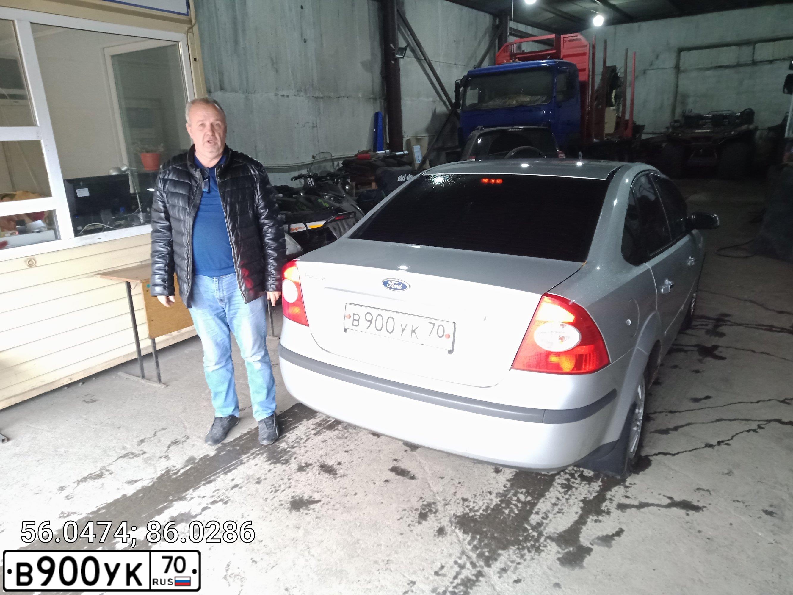 Фото автомобиля FORD FOCUS, 2006 — госномер В900УК70. Цвет: СЕРЕБРИСТЫЙ