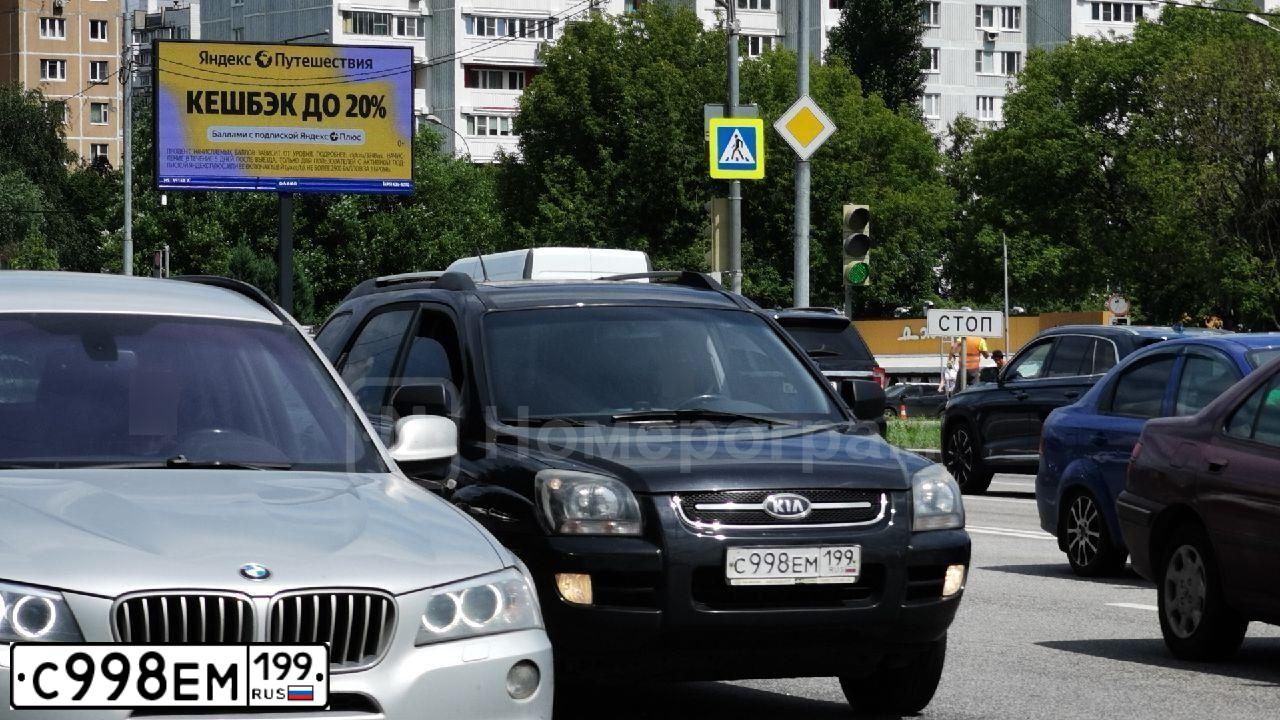 Фото автомобиля KIA SPORTAGE, 2008 — госномер С998ЕМ199. Цвет: ЧЕРНЫЙ