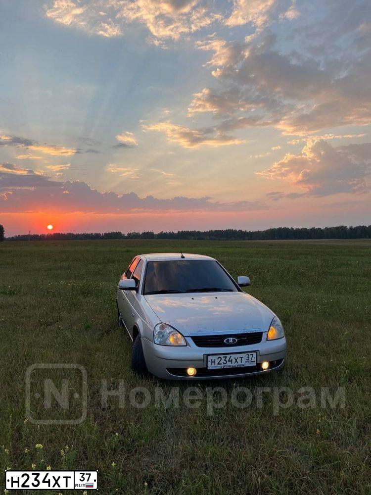 Фото автомобиля LADA 2172 PRIORA, 2012 — госномер Х084СН55. Цвет: СВЕТЛО-СЕРЫЙ
