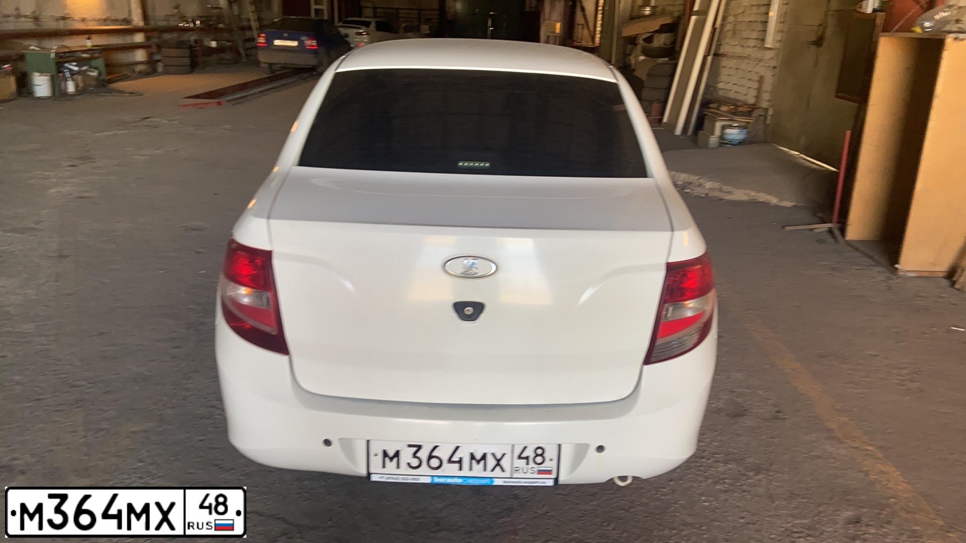 Фото автомобиля LADA 2190 GRANTA, 2013 — госномер Р314ЕС48. Цвет: Белый