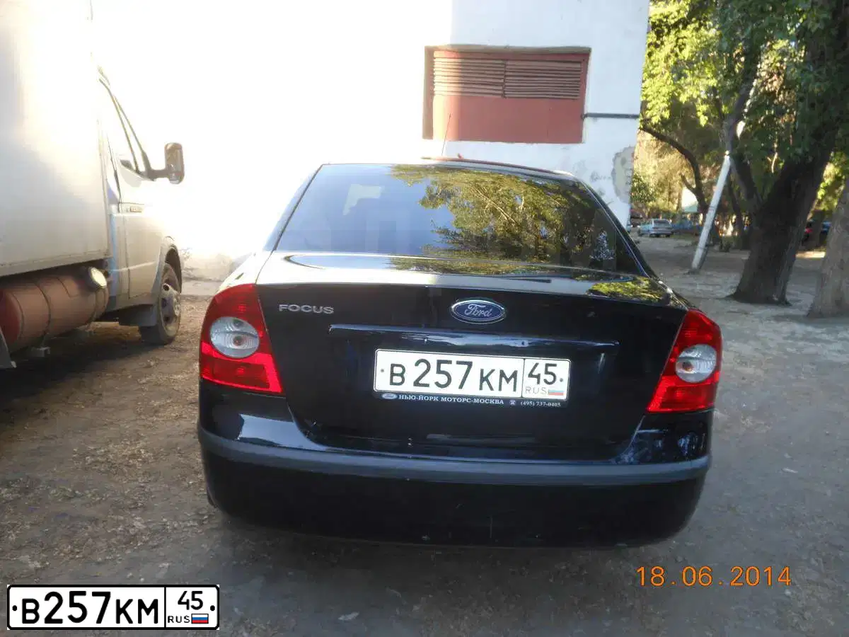 Фото автомобиля FORD FOCUS, 2006 — госномер Х197ЕТ72. Цвет: ТЕМНО СИНИЙ