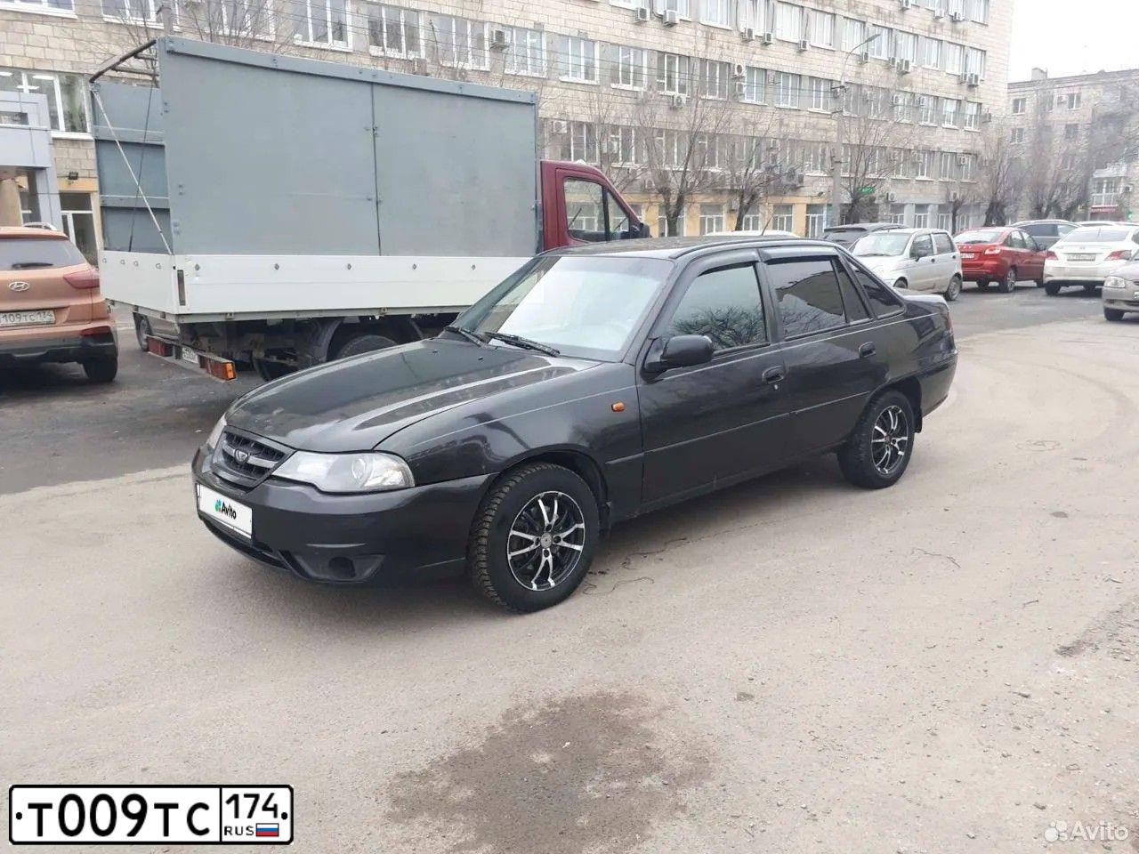 Фото автомобиля NISSAN JUKE, 2014 — госномер Т009ТК174. Цвет: ЧЕРНЫЙ