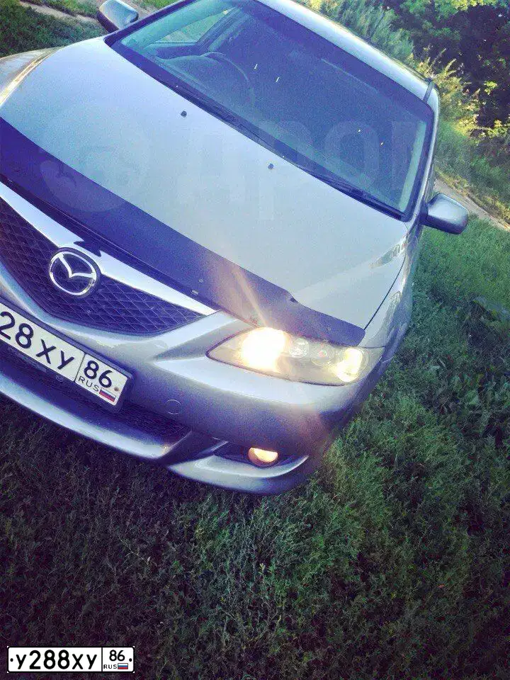 Фото автомобиля FORD FOCUS, 2010 — госномер У288ХУ86. Цвет: ЧЕРНЫЙ