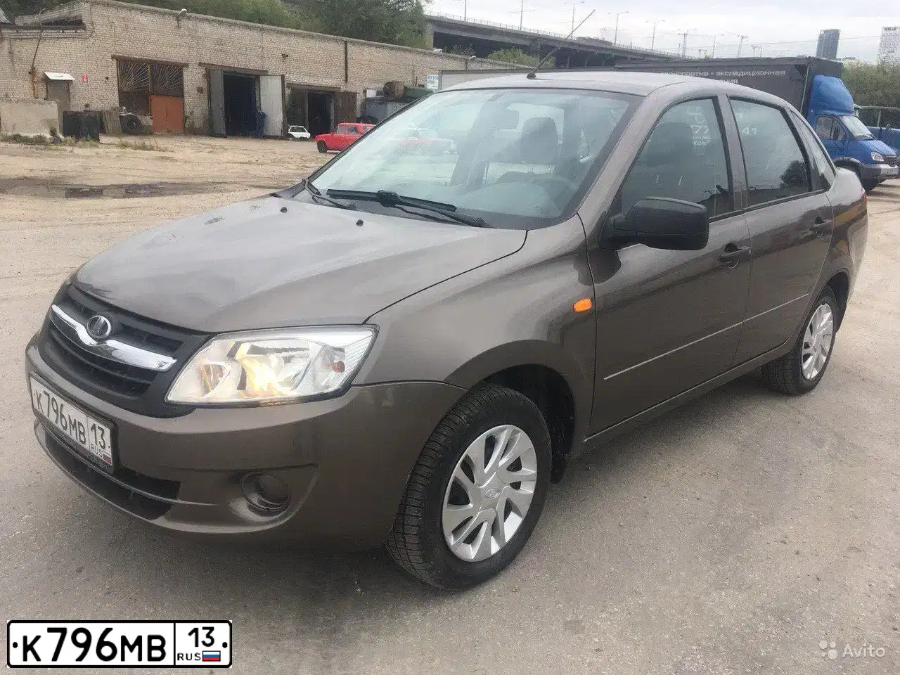 Фото автомобиля LADA 2190 GRANTA, 2014 — госномер К796МВ13. Цвет: золотисто коричневый