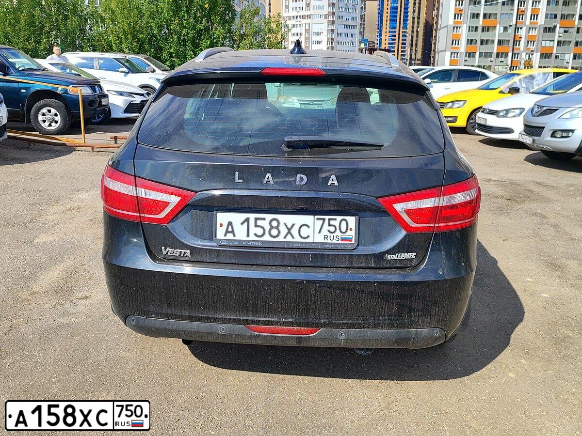 Фото автомобиля LADA VESTA, 2019 — госномер А158ХС750. Цвет: ЧЕРНЫЙ