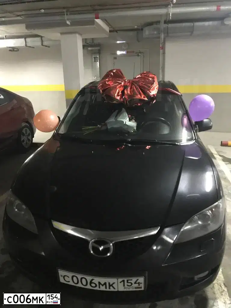 Фото автомобиля MAZDA 3, 2007 — госномер Р655СУ124. Цвет: ЧЕРНЫЙ