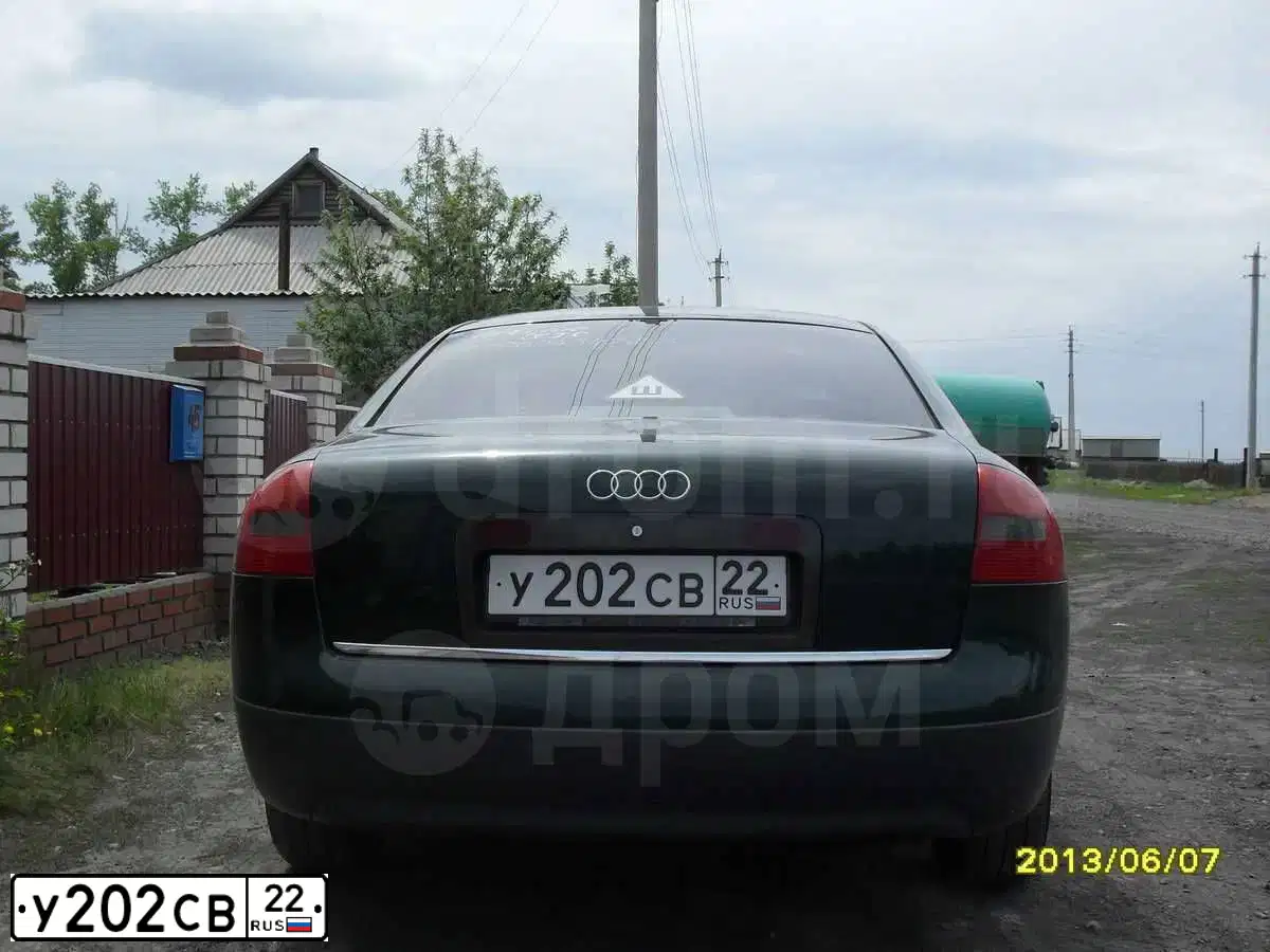 Фото автомобиля AUDI A6, 1997 — госномер О154ХС154. Цвет: ЗЕЛЕНЫЙ