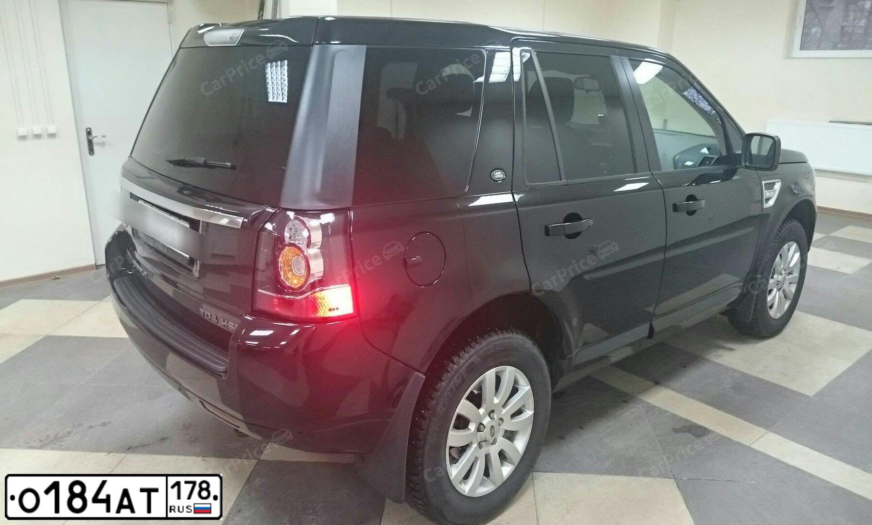 Фото автомобиля LANDROVER FREELANDER, 2013 — госномер К046ХТ763. Цвет: ЧЕРНЫЙ
