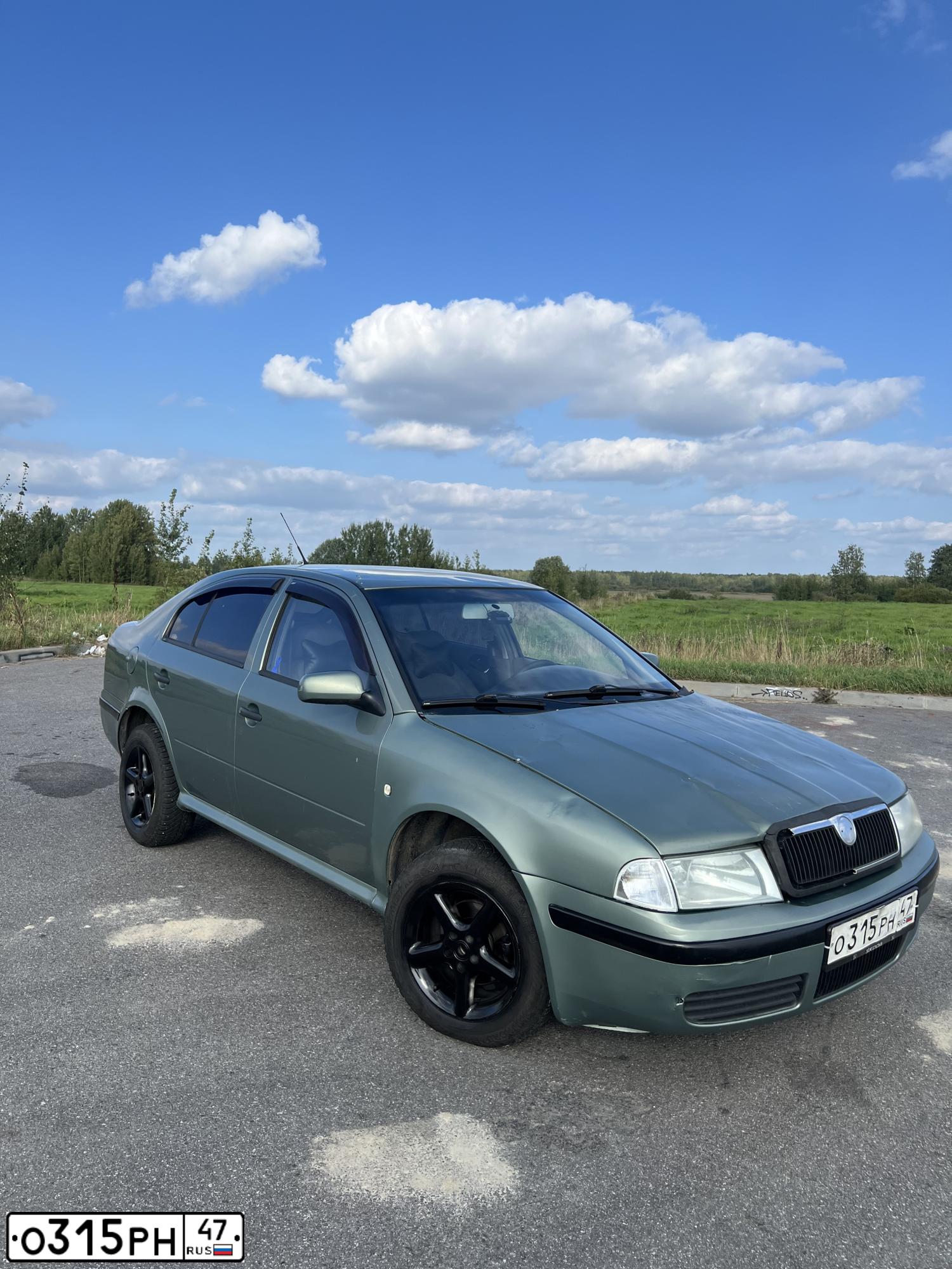 Фото автомобиля SKODA OCTAVIA, 2002 — госномер О315РН47. Цвет: СВЕТЛО-ЗЕЛЕНЫЙ