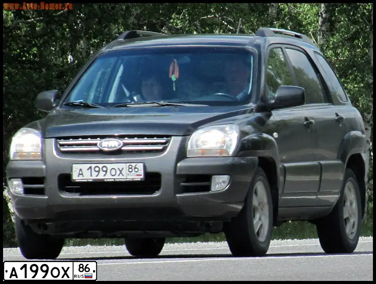 Фото автомобиля KIA SPORTAGE, 2006 — госномер В845ВК702. Цвет: ЧЕРНЫЙ