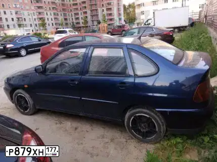 Фото автомобиля VOLKSWAGEN POLO, 1999 — госномер Н973КС99. Цвет: ТЕМНО-СИНИЙ