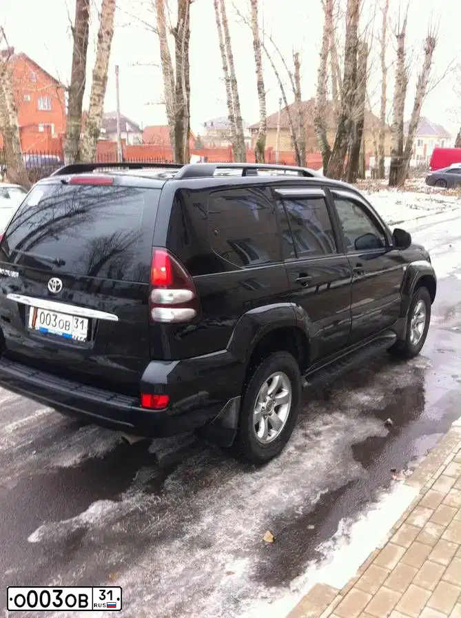 Фото автомобиля FORD S-MAX, 2011 — госномер К909РР31. Цвет: Белый