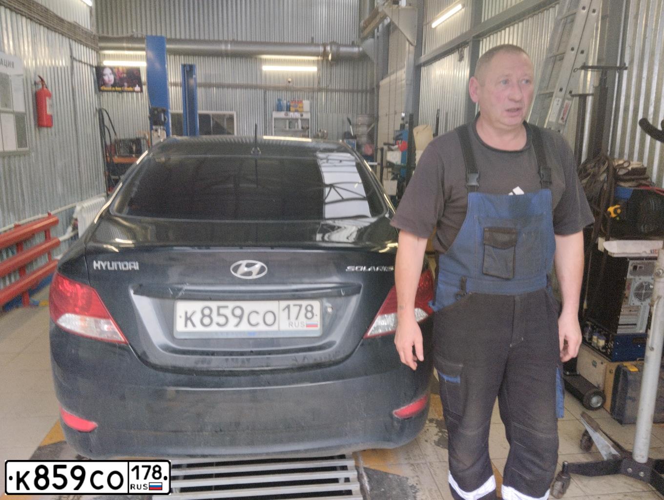 Фото автомобиля HYUNDAI SOLARIS, 2011 — госномер Е206ЕР147. Цвет: ЧЕРНЫЙ