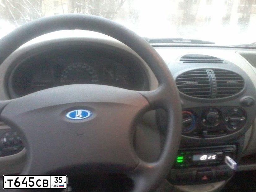 Фото автомобиля LADA 1119 KALINA, 2007 — госномер Т645СВ35. Цвет: Серо-Синий