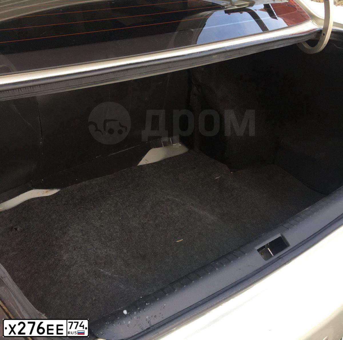 Фото автомобиля FAW V5, 2013 — госномер Е594ХК702. Цвет: ЗОЛОТИСТЫЙ