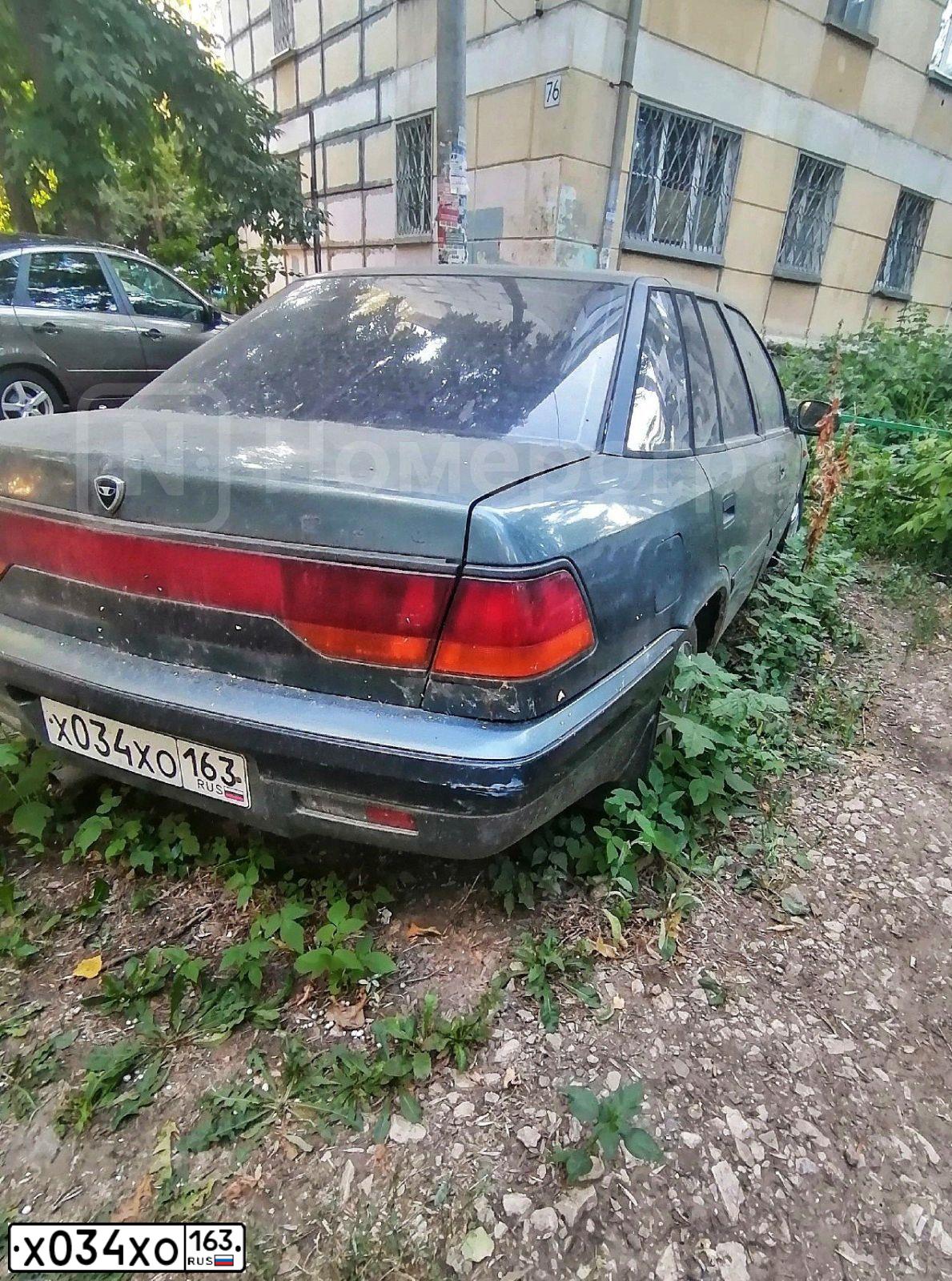 Фото автомобиля DAEWOO ESPERO, 1997 — госномер Х034ХО163. Цвет: Серый