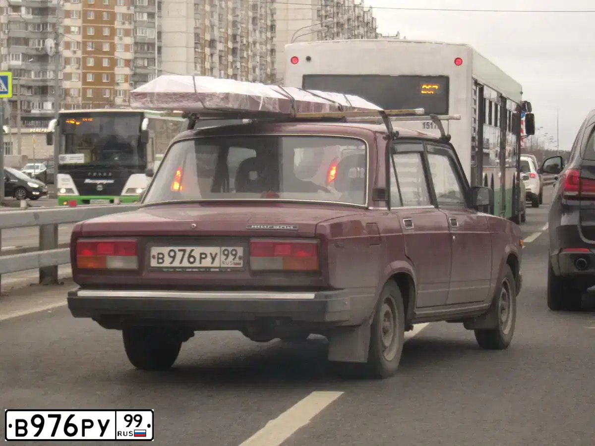 Фото автомобиля LADA 2107, 2001 — госномер В976РУ99. Цвет: ТЕМНО-ВИШНЕВЫЙ