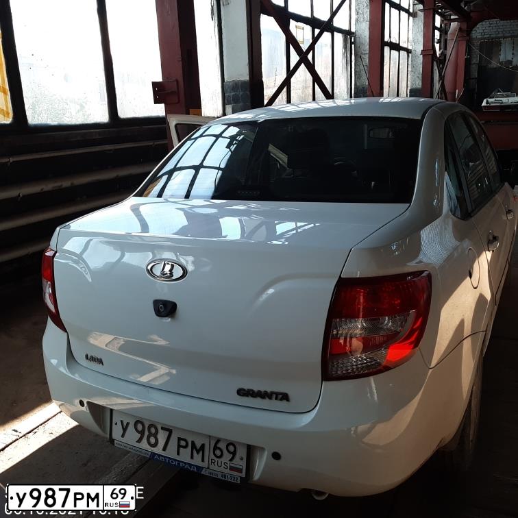 Фото автомобиля LADA 2190 GRANTA, 2013 — госномер О050НУ58. Цвет: БЕЛЫЙ