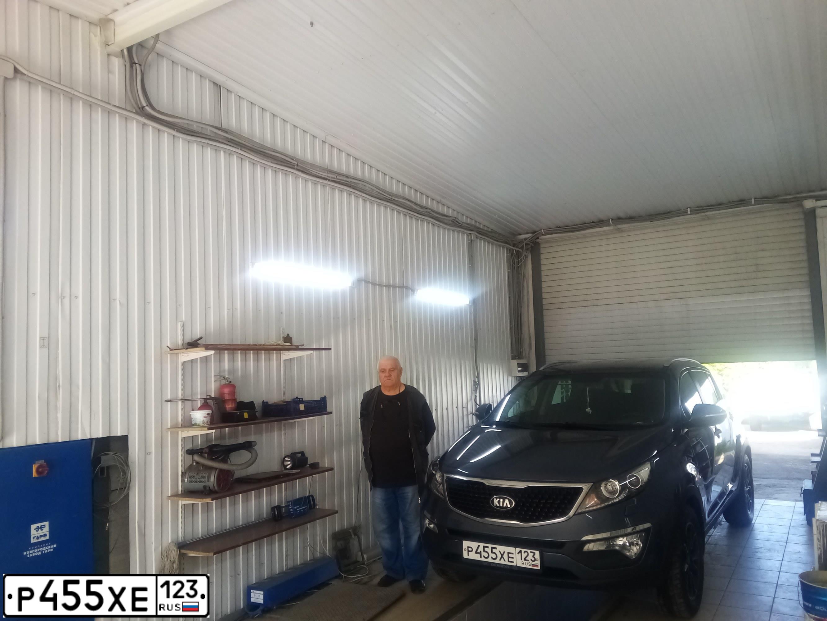 Фото автомобиля KIA SPORTAGE, 2015 — госномер Р455ХЕ123. Цвет: синий
