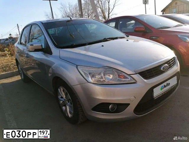Фото автомобиля FORD FOCUS, 2008 — госномер Х851ТК55. Цвет: Серебристый