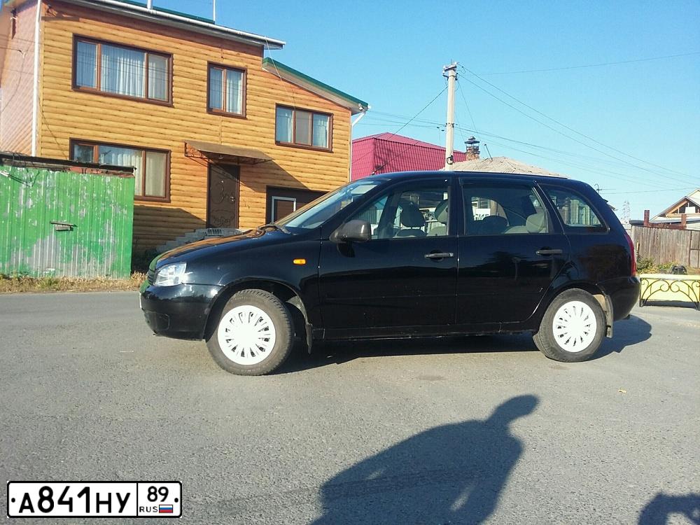 Фото автомобиля LADA 1117 KALINA, 2012 — госномер Р220ТО196. Цвет: Сине-Черный