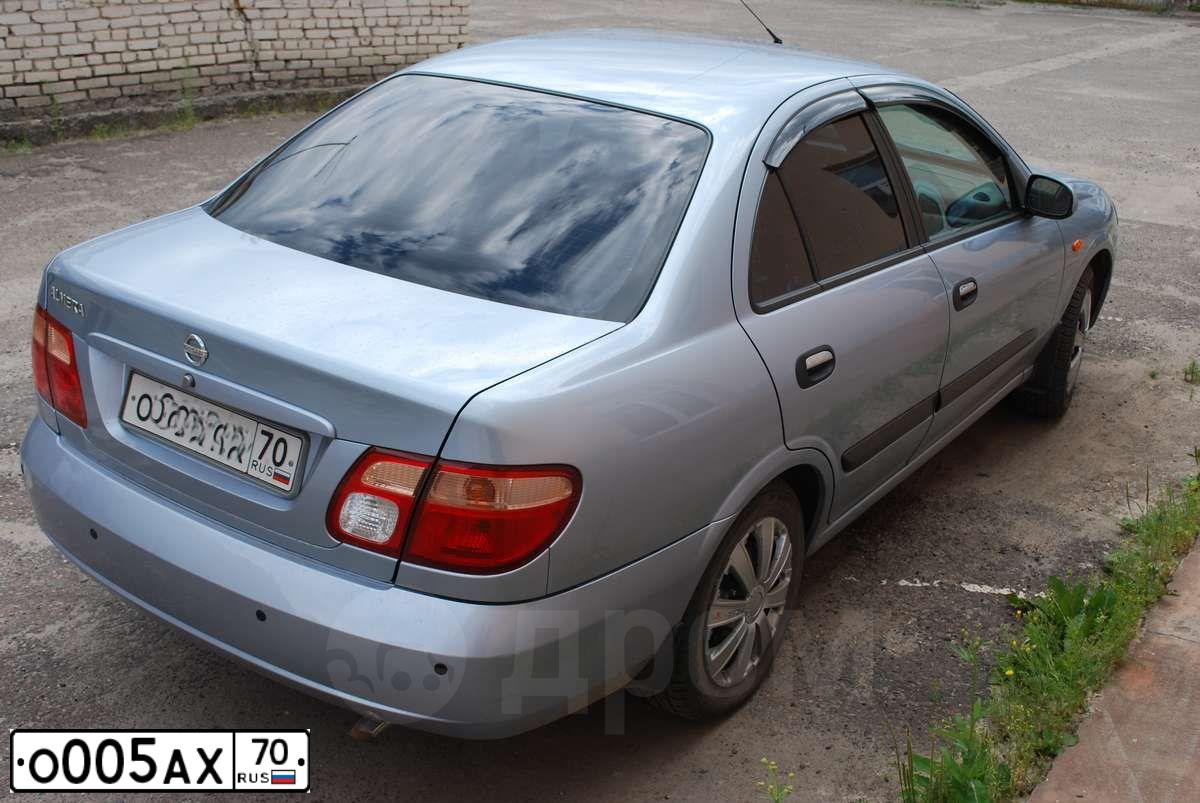Фото автомобиля GAZ 3102 WOLGA, 2003 — госномер О005АХ70. Цвет: Серебристый