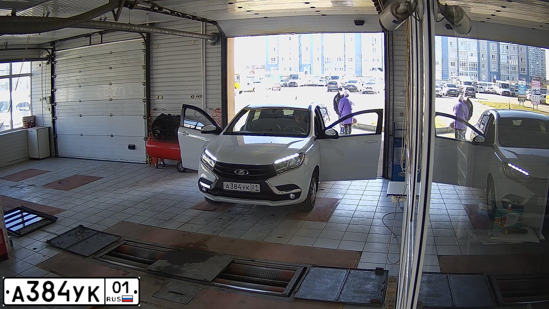 Фото автомобиля LADA XRAY, 2016 — госномер А519МО164. Цвет: Белый