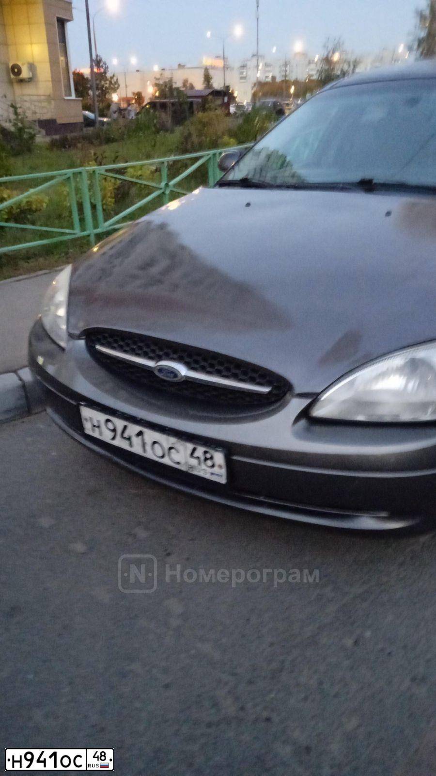 Фото автомобиля FORD TAURUS, 2003 — госномер Н941ОС48. Цвет: СЕРЫЙ