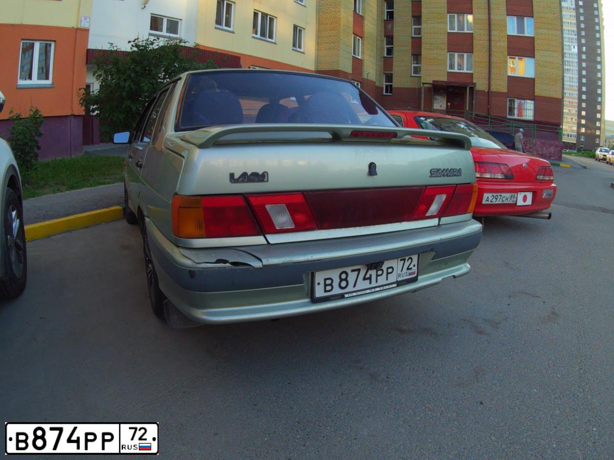 Фото автомобиля LADA 2115 SAMARA, 2006 — госномер В874РР72. Цвет: БЕЛО-ЗЕЛЕНЫЙ