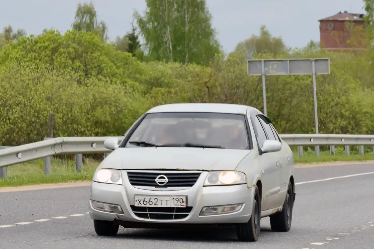 Фото автомобиля NISSAN ALMERA, 2007 — госномер Х662ТТ190. Цвет: СЕРЫЙ