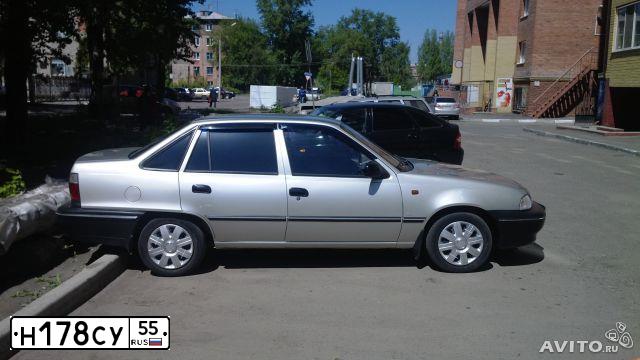 Фото автомобиля DAEWOO NEXIA, 2007 — госномер Н178СУ55. Цвет: Серебристый