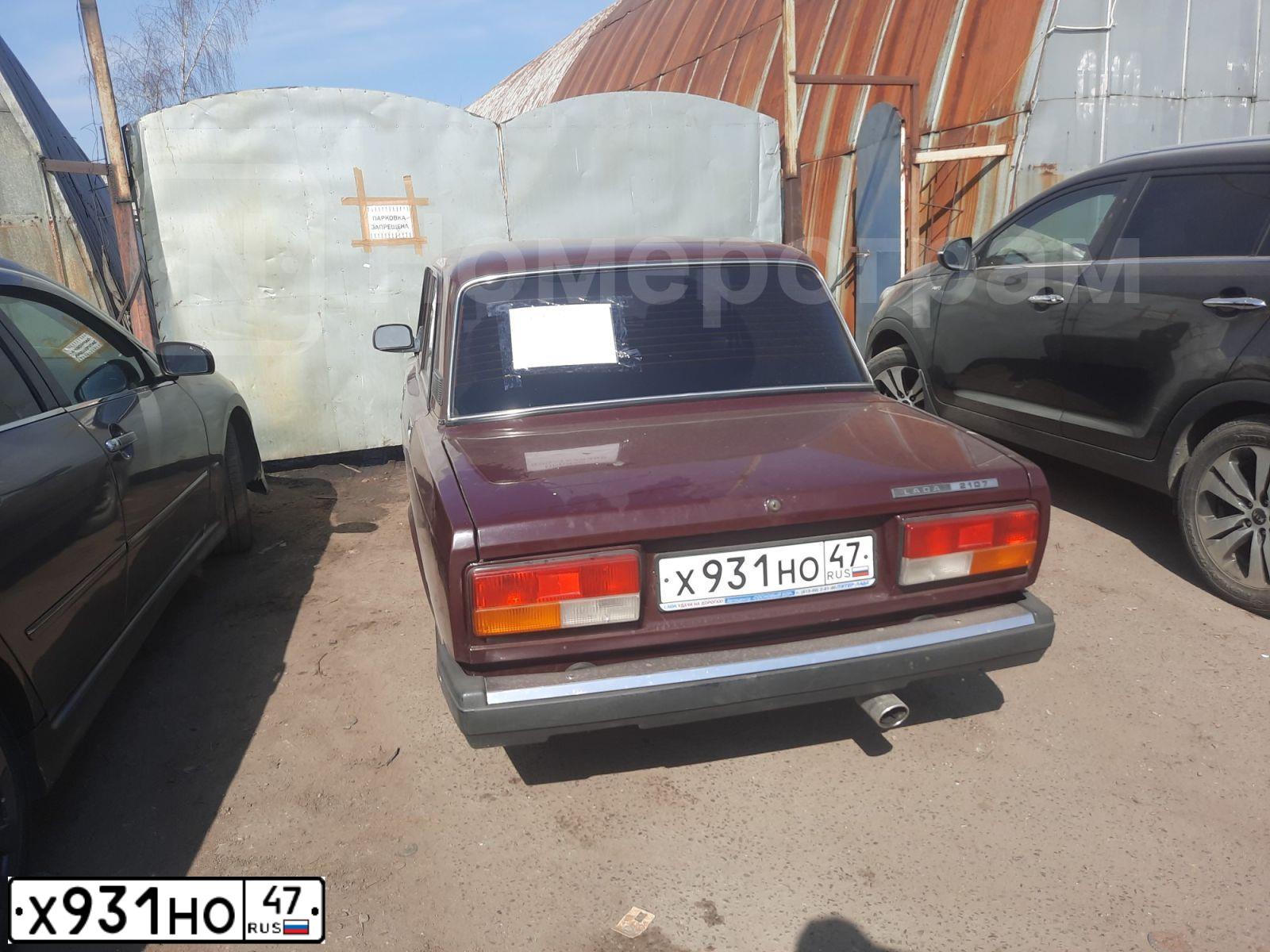 Фото автомобиля LADA 2107, 2007 — госномер Х931НО47. Цвет: ТЕМНО-ВИШНЕВЫЙ